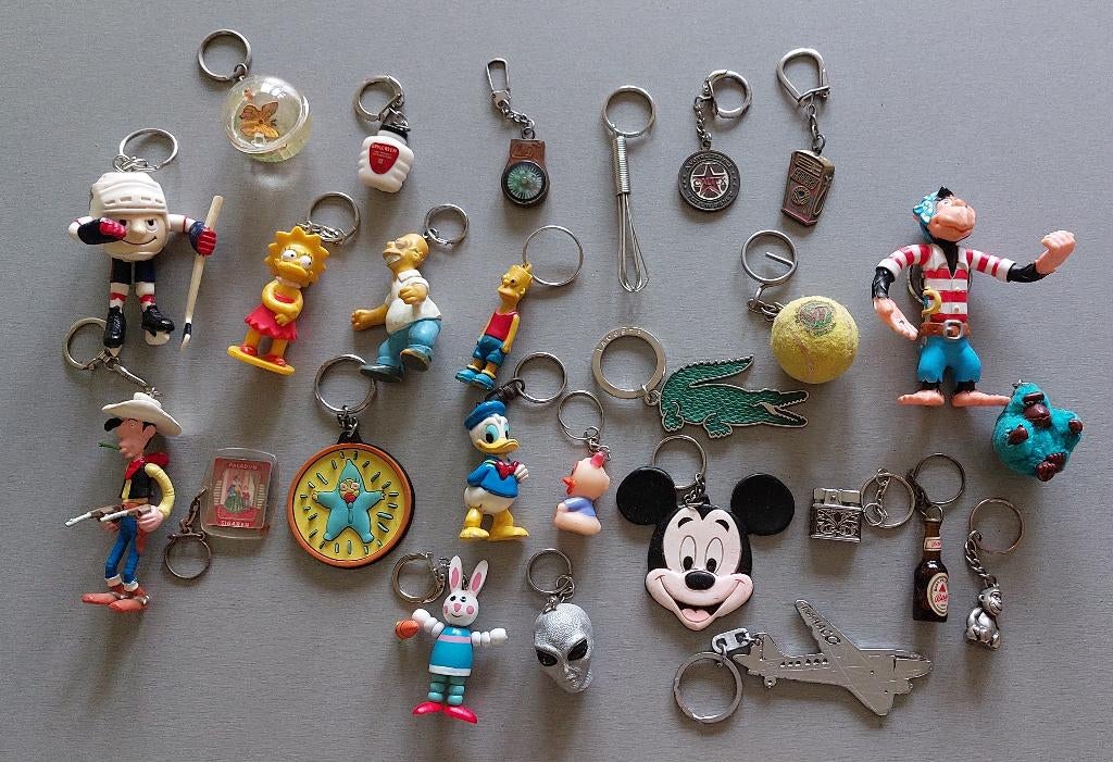 Lot sleutelhangers Lucky Luke Simpsons bier sigaren aansteke, Ophalen of Verzenden, Gebruikt, Overige typen