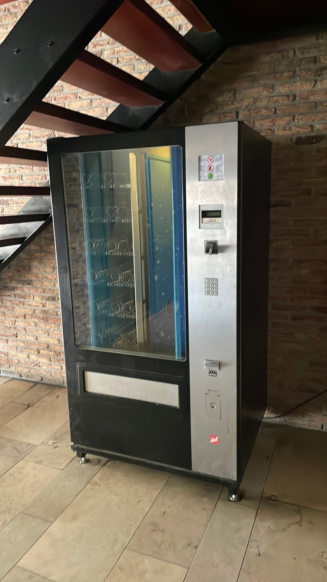 Machine de distribuation automatique, Ophalen