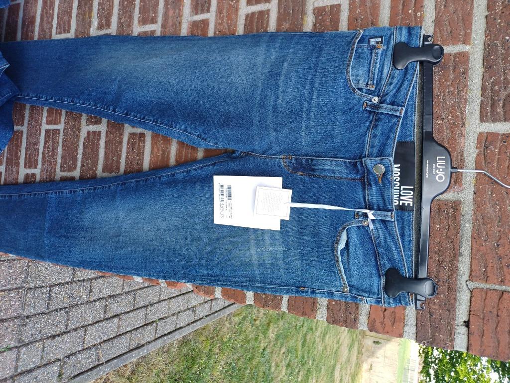 Dames jeans broeken Moschino Mt 32, 34, Ophalen of Verzenden, Nieuw, Maat 34 (XS) of kleiner, Blauw