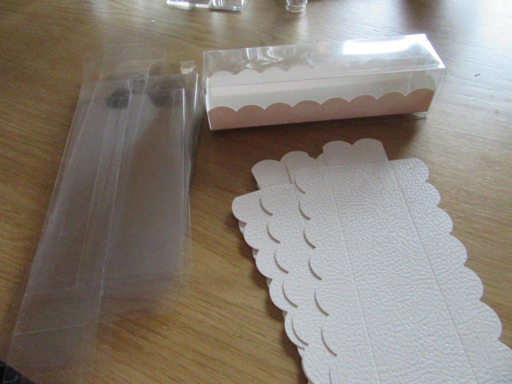 7 emballages plastiques pour pralines, dragées, ... neufs, Ophalen