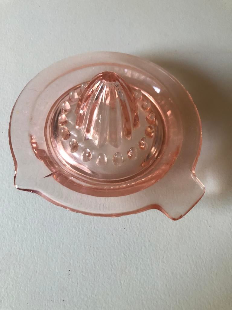 Presse orange ancien en verre