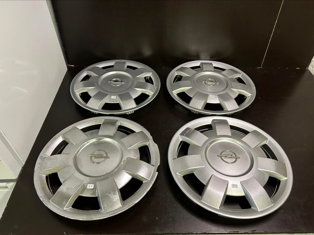 4 enjoliveurs Opel corsa astra combo 14", Enlèvement ou Envoi, Utilisé