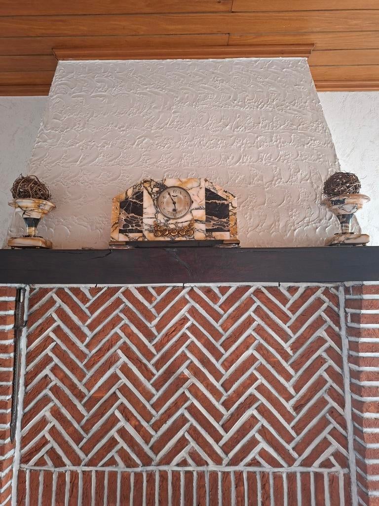 Antieke marmeren schouwgarnituur, Ophalen