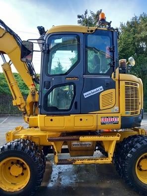 Mini-pelle sur pneus, Enlèvement, Grue