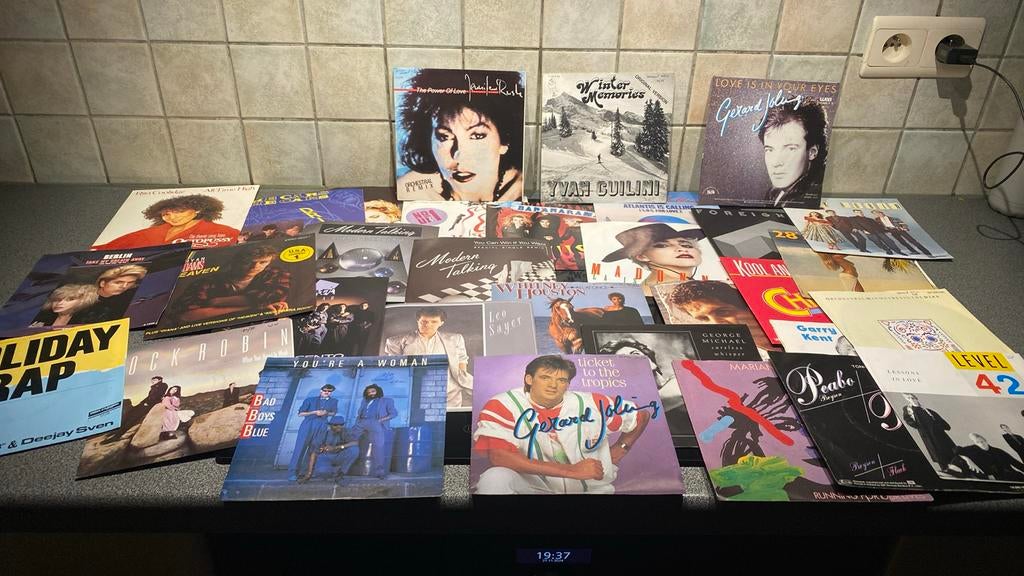 Collection de photos en 45 tours, Enlèvement, Comme neuf