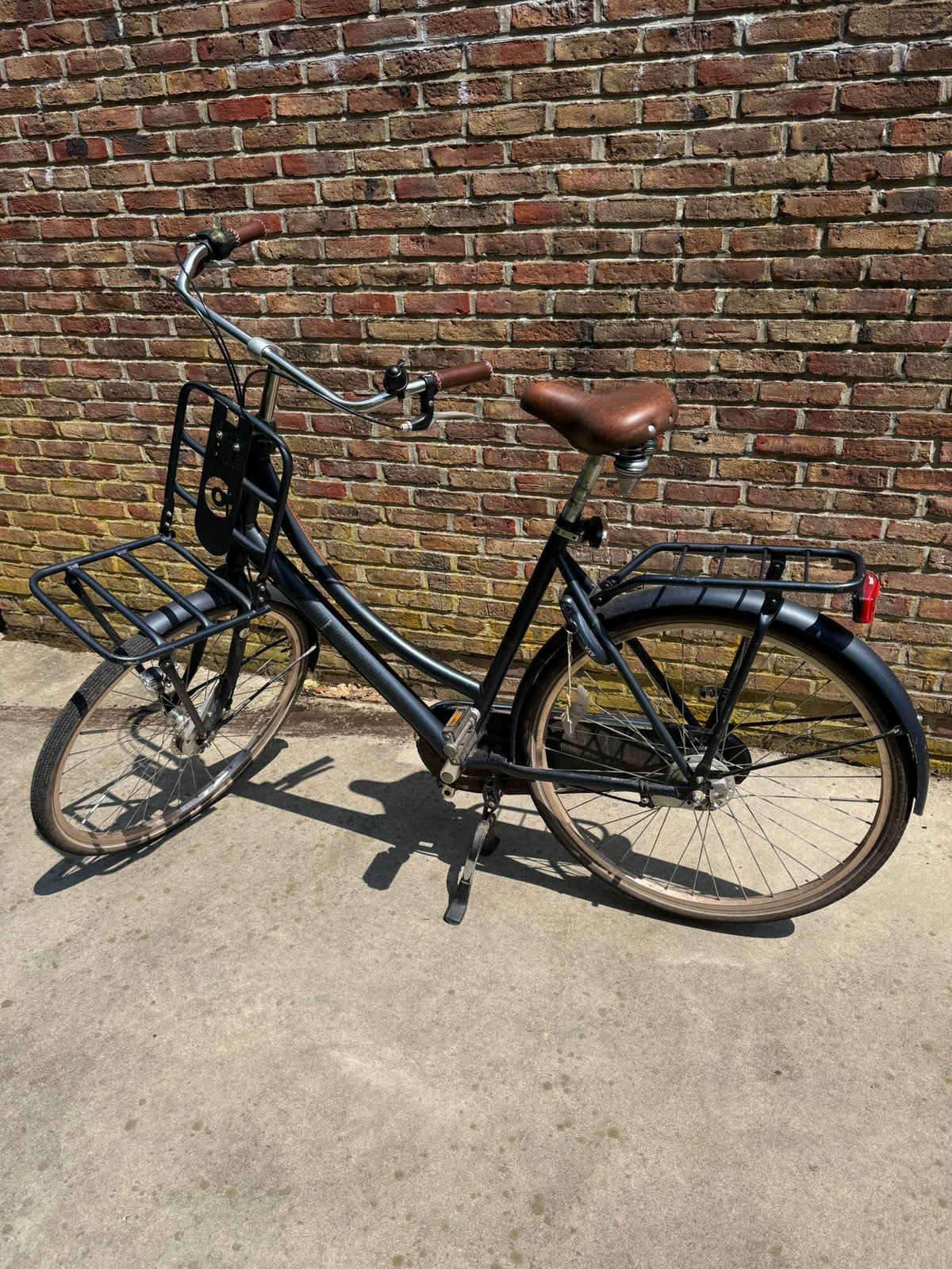 Donkerblauwe damesfiets groot formaat, Fietsen en Brommers, Ophalen, Gebruikt, Velgrem, 56 cm of meer
