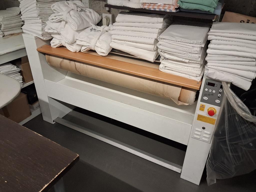 Strijkrol machine, Enlèvement