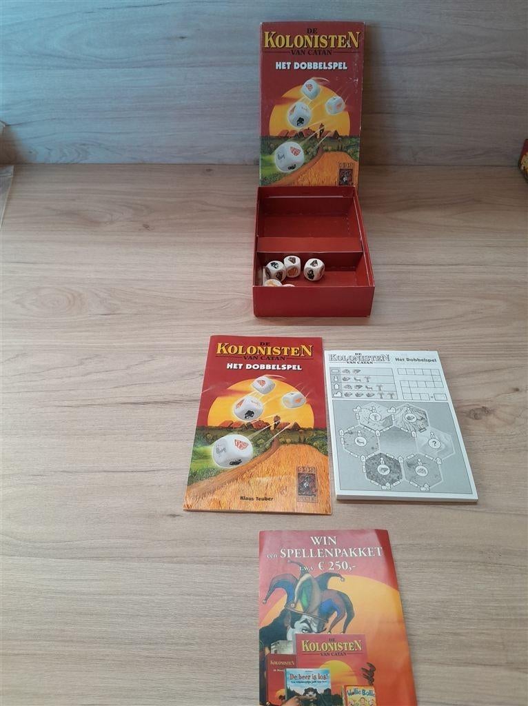 De kolonisten van Catan - het dobbelspel - s3739, Hobby en Vrije tijd, Gezelschapsspellen | Bordspellen, Verzenden, Zo goed als nieuw