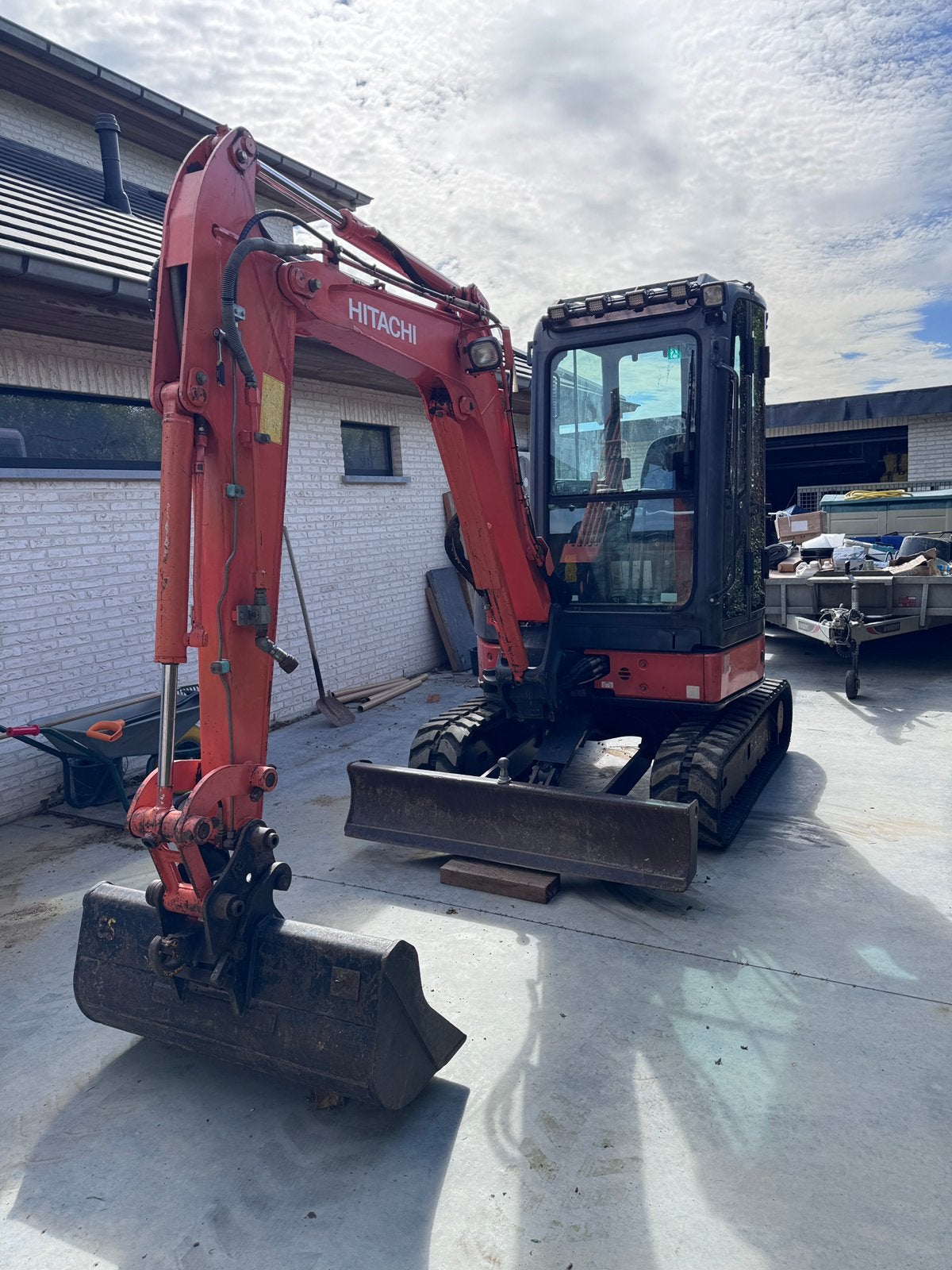 Graafkraan hitach zx27 + dieplader, Ophalen