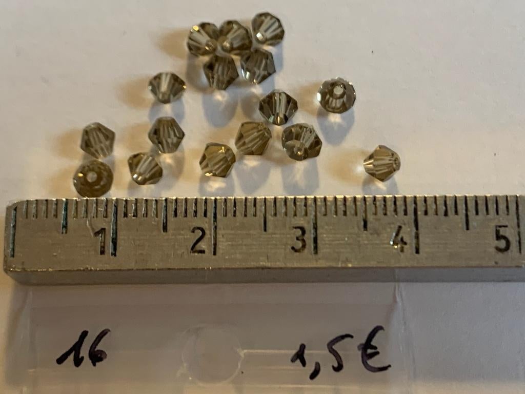 16 Swarovski tolletjes transparant grijs, Ophalen of Verzenden, Nieuw, Kraal