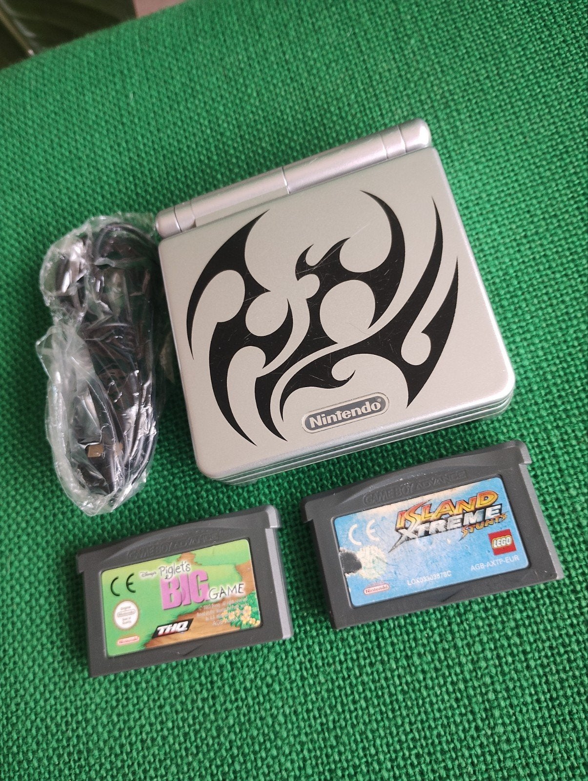 Nintendo Gameboy Advance SP Tribal Edition, Games en Spelcomputers, Spelcomputers | Nintendo Game Boy, Ophalen of Verzenden, Gebruikt