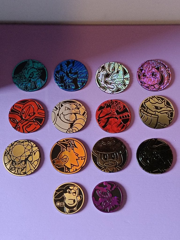 Lot van 14 pokémon munten., Ophalen of Verzenden, Zo goed als nieuw, Overige typen