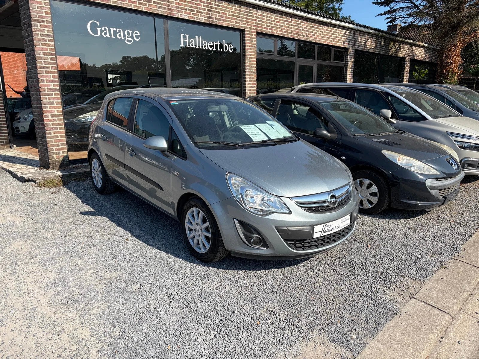 Opel Corsa 2 jaar garantie (bj 2012), Auto's, Euro 5, Stof, Gebruikt, 4 cilinders