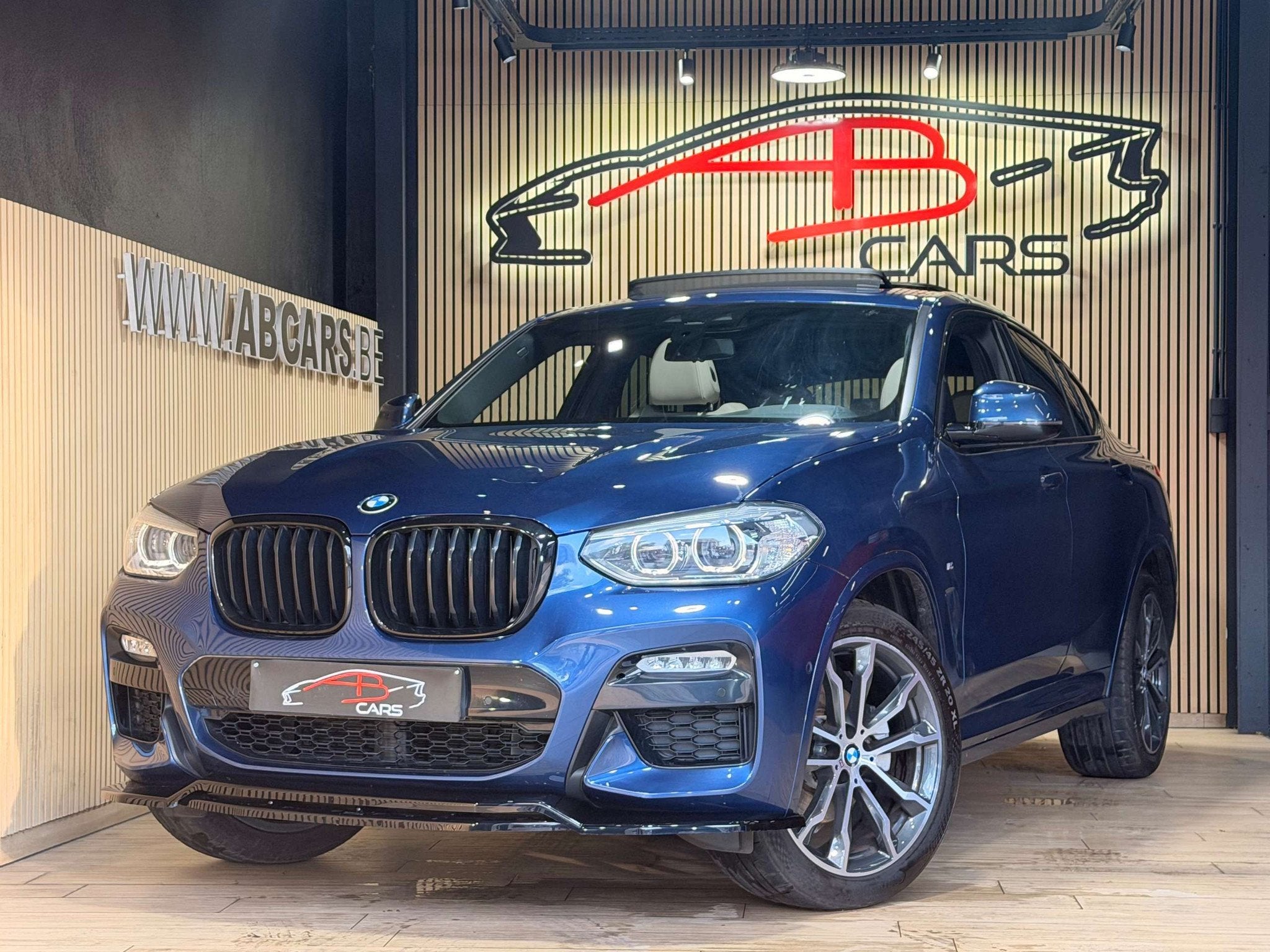 BMW X4 2.0iA xDrive20 * PACK M PERFORMANCE / LOOK X4M * GARA, Auto's, Automaat, Gebruikt, 4 cilinders, Blauw