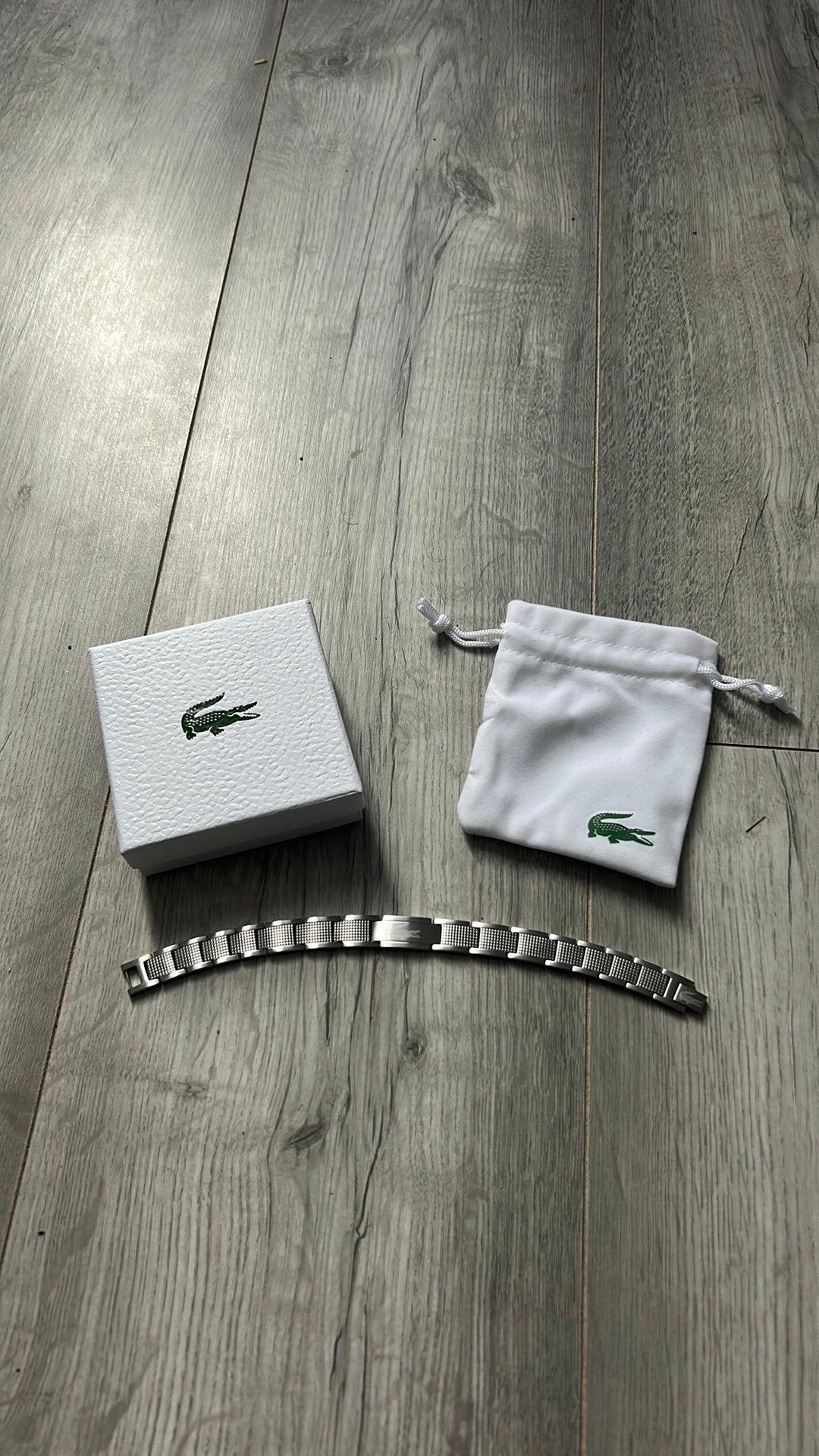 Bracelet lacoste neuf, Handtassen en Accessoires, Ophalen, Nieuw, Staal