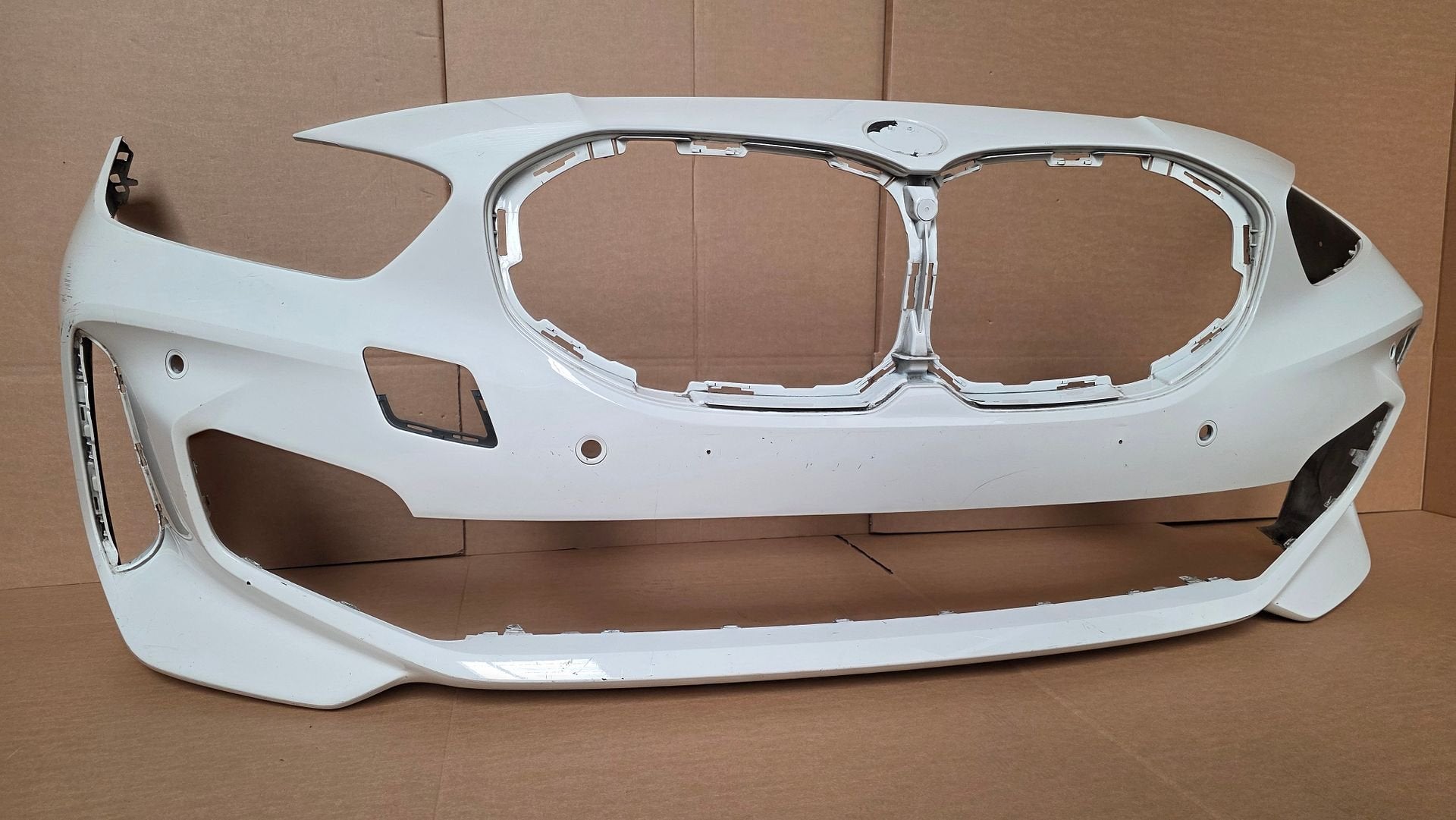 Voorbumper BMW 1 Serie F40 M Pakket 4xPDC 51118070928 Bumper, Gebruikt, -, Voor, Ophalen of Verzenden