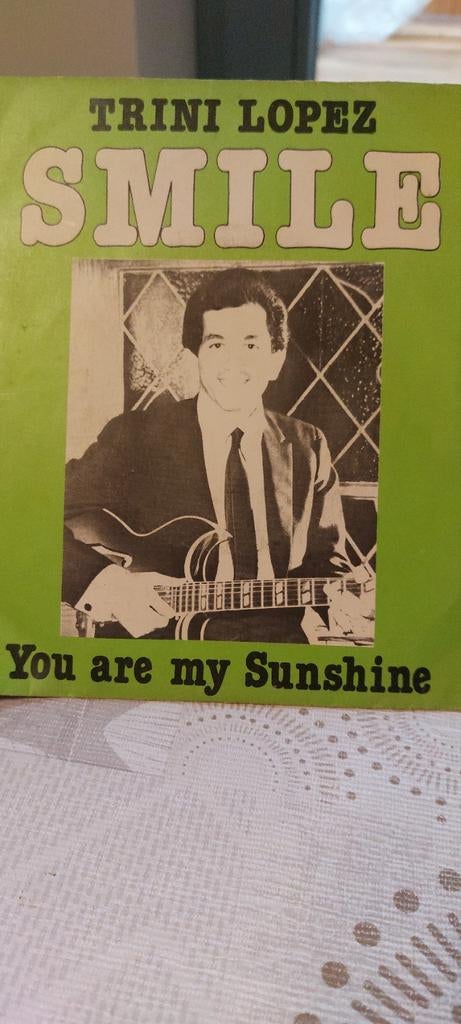 Vinyle 45 tours Trini Lopez Smile, Enlèvement
