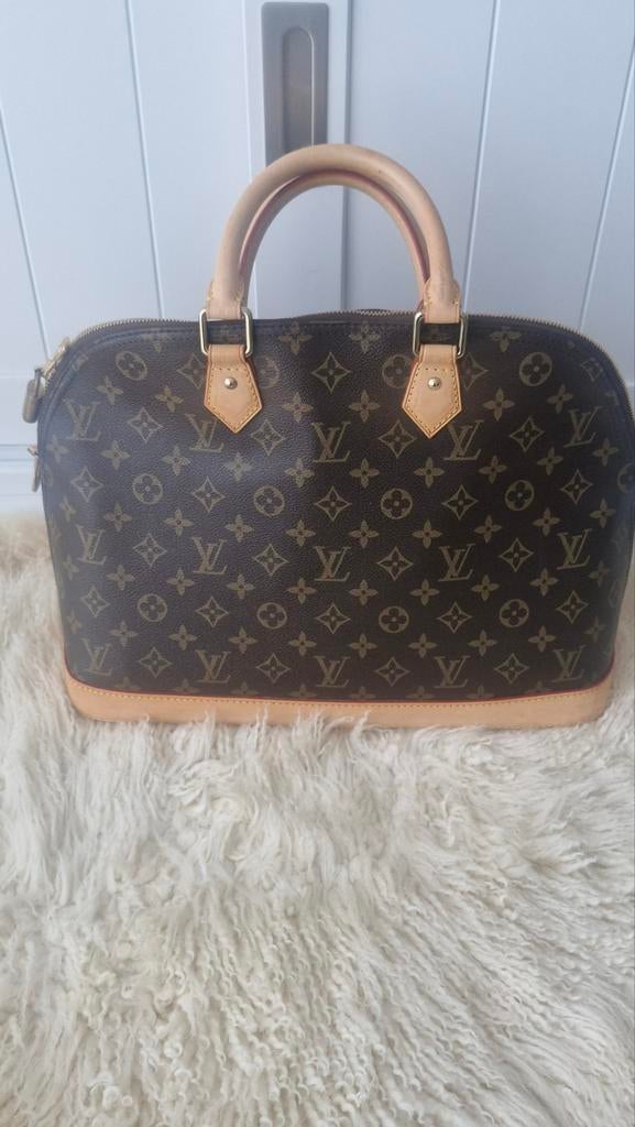 Sac louis vuitton comme neuf eddition limitée
