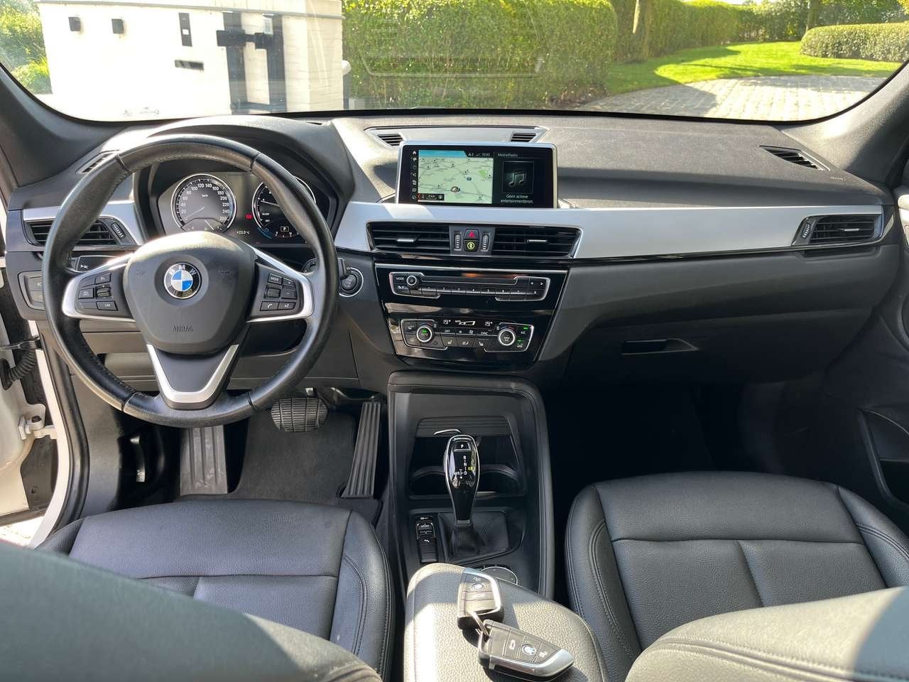 BMW X1 1.5iA sDrive18 OPF/76100km/Leder/Camera/Navi/Cruise/, Auto's, Zwart, Wit, Bedrijf, 5 zetels