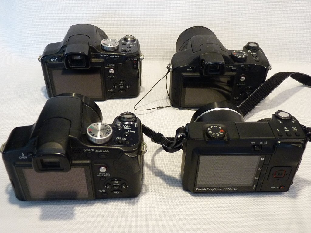 4x digitale bridgecamera: Panasonic Lumix en Kodak, Panasonic, Accu, 10 megapixels, Ophalen of Verzenden