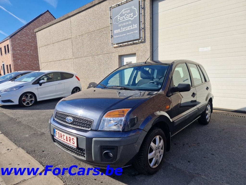 Ford Fusion 1.4 benzine 80 pk weinig km + 1 j garantie, Auto's, Voorwielaandrijving, Stof, Euro 4, Zilver of Grijs