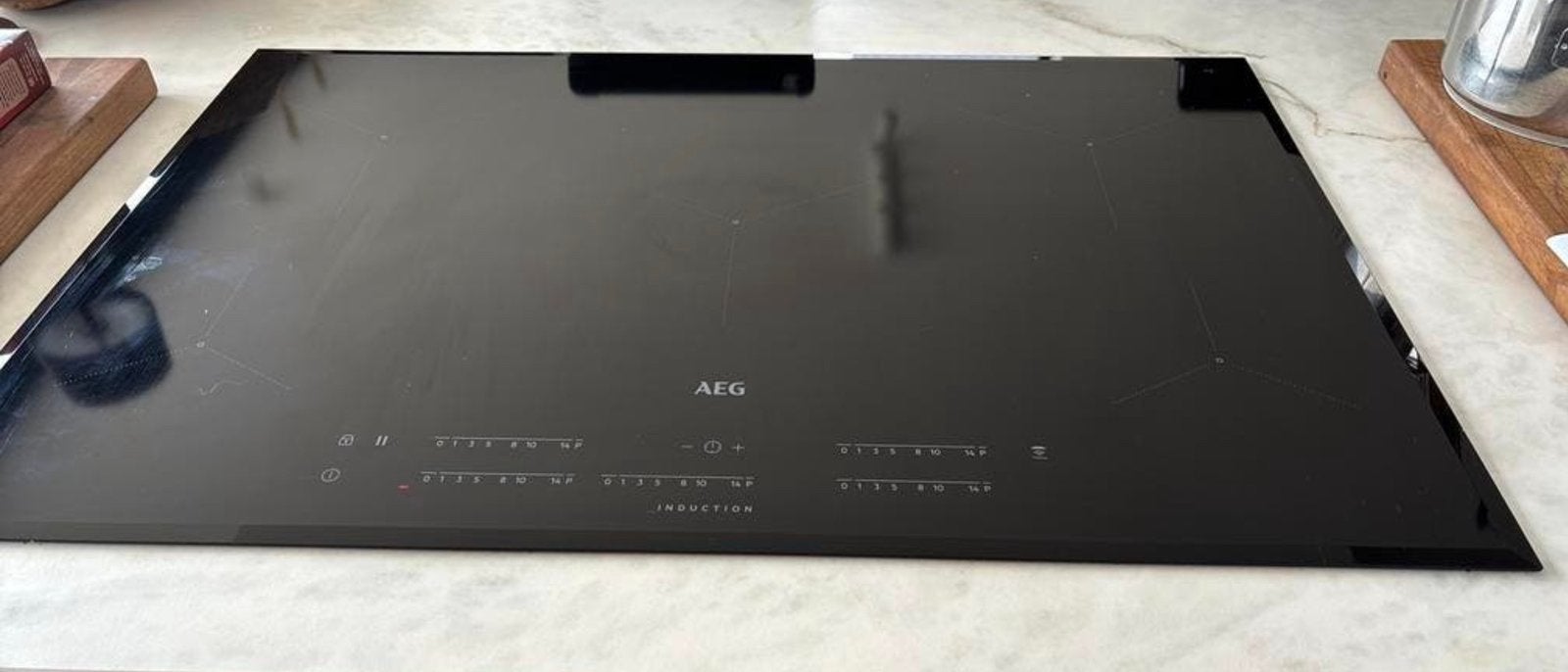 Cuisinière à induction AEG 78 cm en parfait état, Enlèvement, Comme neuf