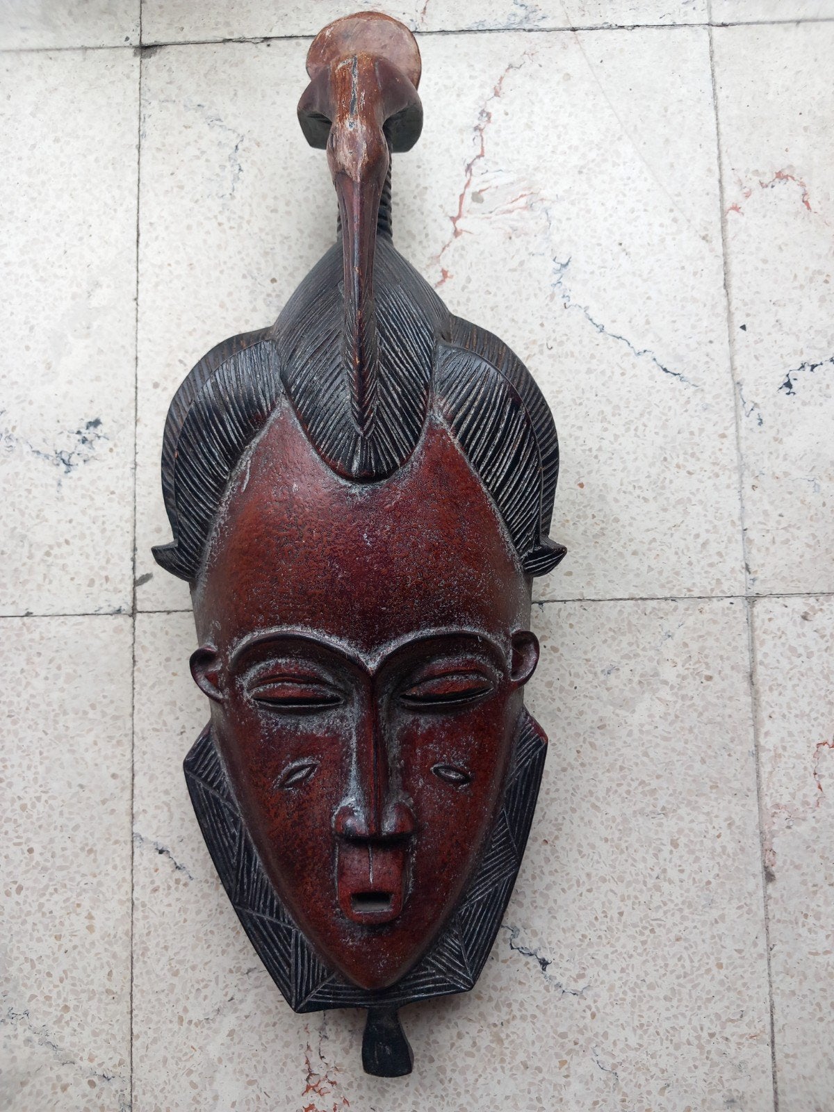 Afrikaans masker., Ophalen