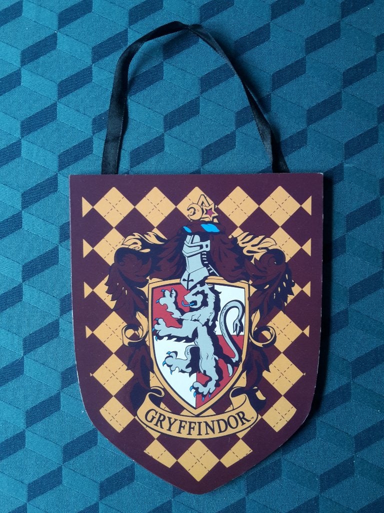 Gryffindor wapenschild, Harry Potter, 19 cm hoog, Enlèvement ou Envoi, Comme neuf, Réplique