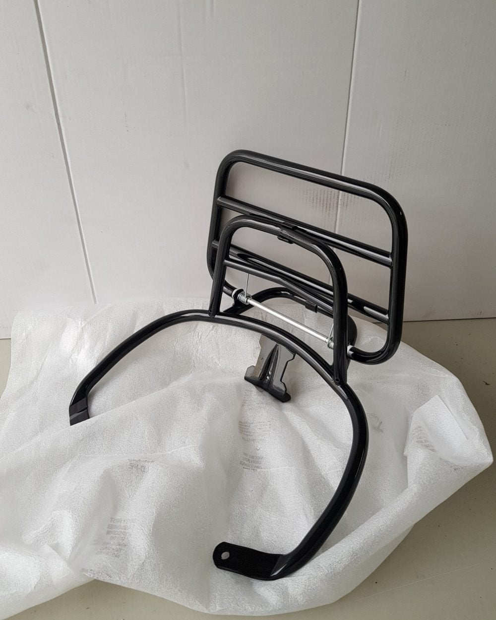 Vespa achterdrager zwart, Ophalen