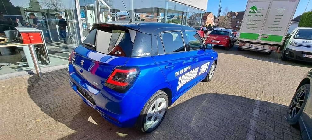 Suzuki Swift 1.2i SHVS Grand Luxe + 12V, Auto's, Gebruikt, Blauw, Swift, Bedrijf