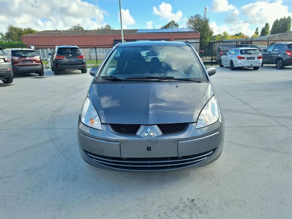 Mitsubishi Colt 1.3i | 83.000km | Airco, Achat, Entreprise, https://public.car-pass.be/vhr/6e85e49f-418f-4358-a718-4b6df456aa97