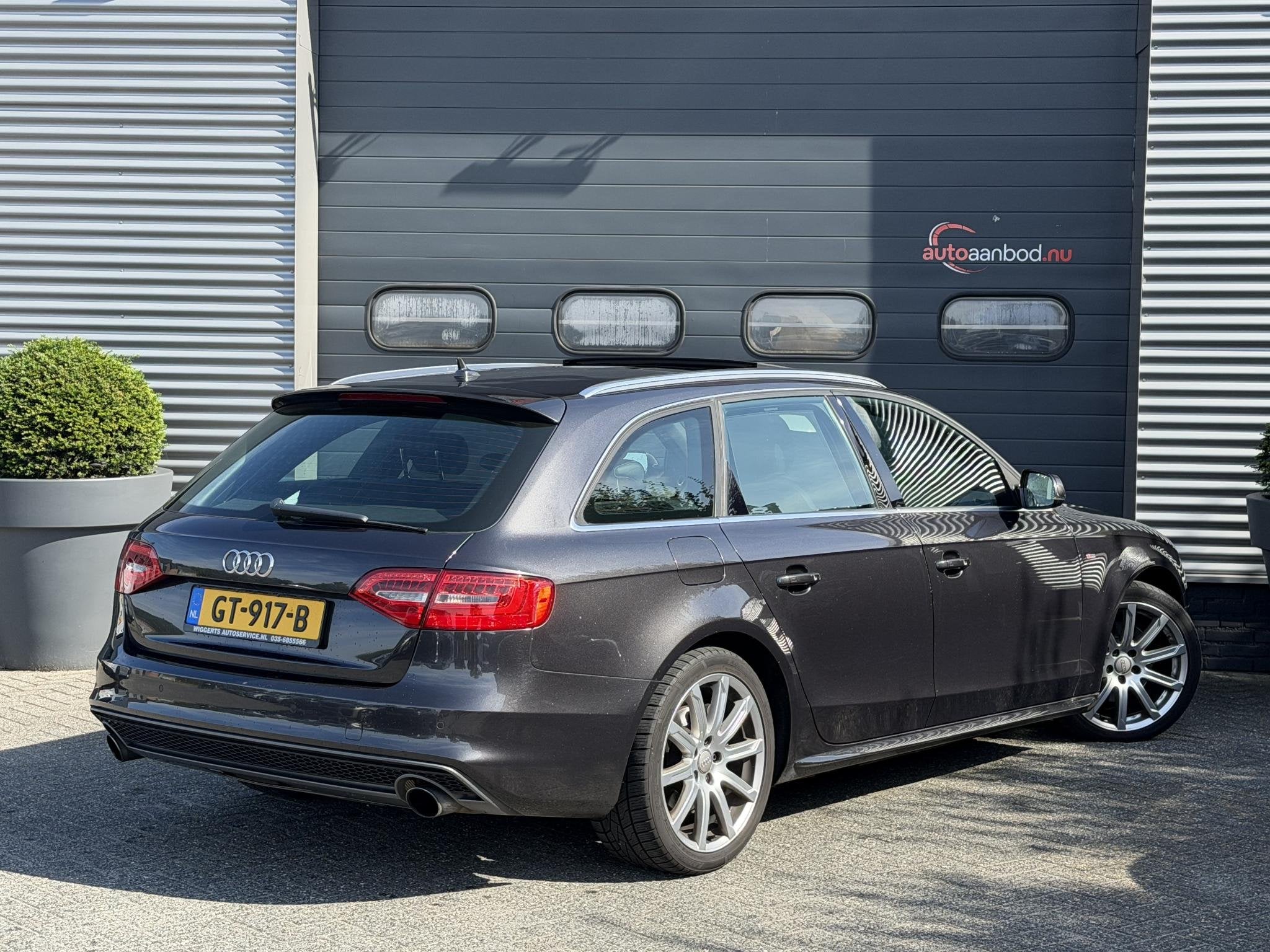 Audi A4 Avant 1.8 TFSI S Edition | Panoramdak | Navigatie |, Auto's, Euro 5, Gebruikt, Zwart, 4 cilinders