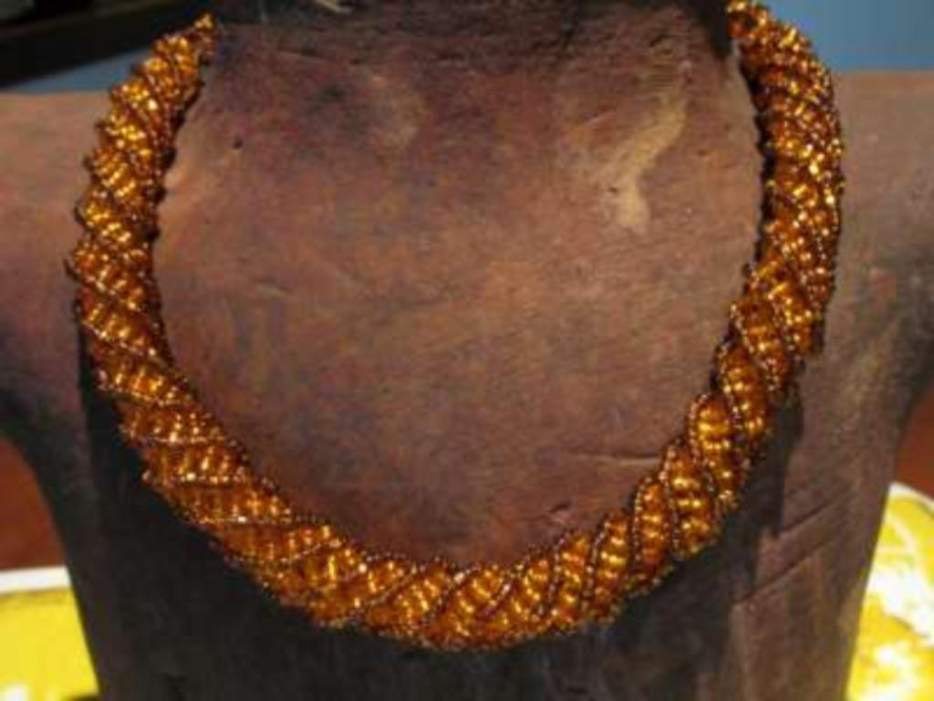 Spiraal ketting: oranje en bruin, Bijoux, Sacs & Beauté, Colliers, Enlèvement ou Envoi, Neuf, Brun, Autres matériaux