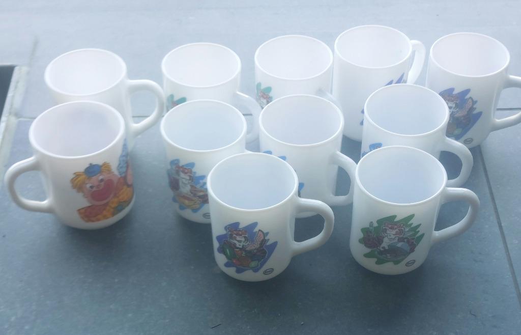11 Drinktassen figuurtjes clowns en tijgers ( retro ), Ophalen, Nieuw, Porselein, Kop en/of schotel