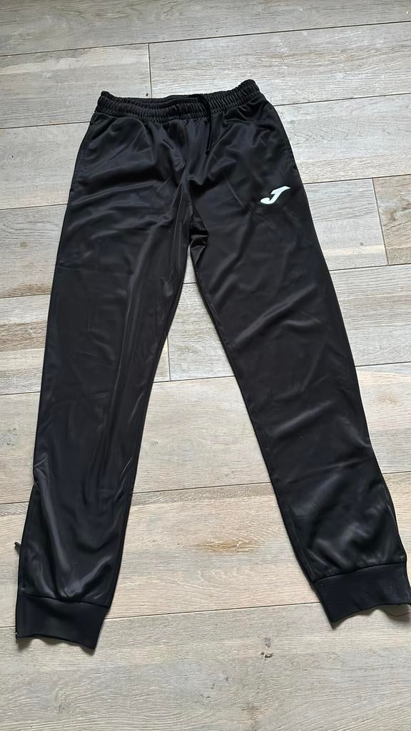 Zwarte trainingsbroek Jako. Maat 14/XS, Ophalen of Verzenden, Zo goed als nieuw