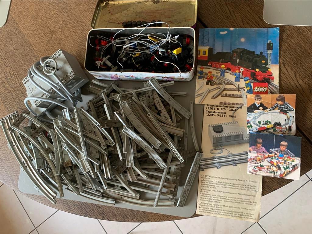 Lego 12 volt trein sporen en onderdelen + folders, Kinderen en Baby's, Speelgoed | Duplo en Lego, Ophalen of Verzenden, Gebruikt