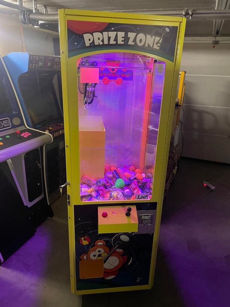 Grue foraine / Claw machine Prize Zone, Enlèvement