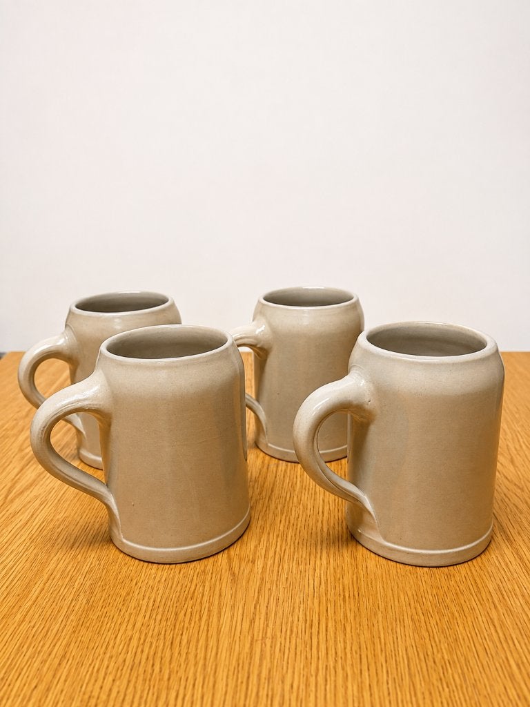 Set van 4 grote beige steengoed bierpullen, Antiek en Kunst, Ophalen