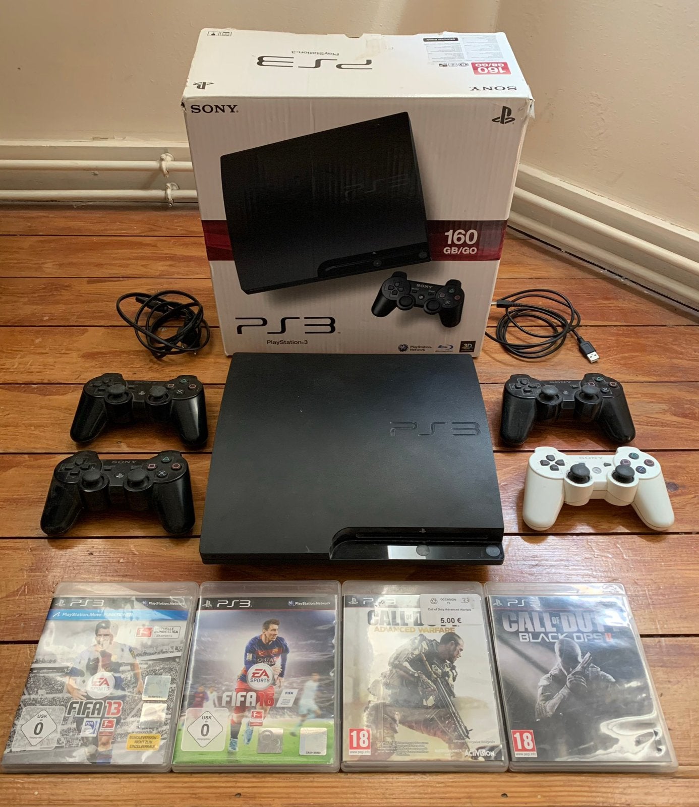 PlayStation 3 Slim 160 GB + 4 controllers + 4 games + doos, Ophalen of Verzenden, Zo goed als nieuw, Slim