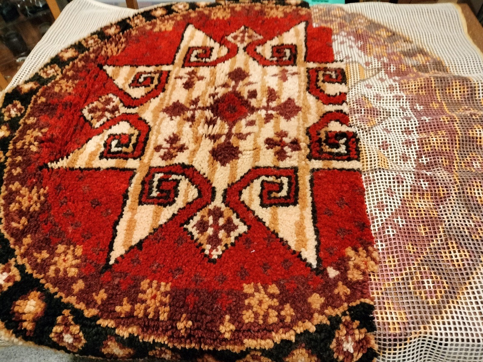 knoop tapijt, Enlèvement