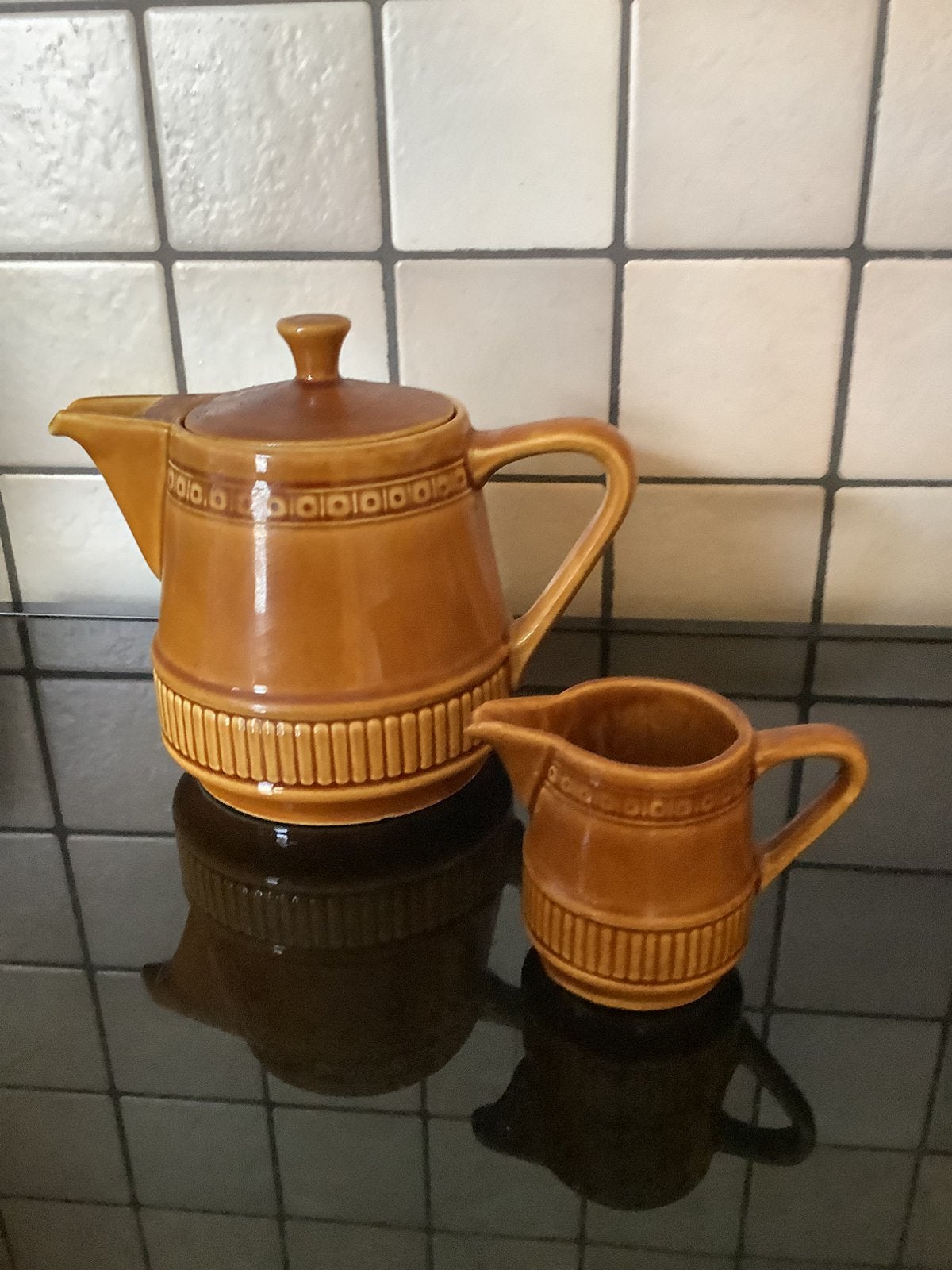 Bruine koffie- en melkkan, Ophalen