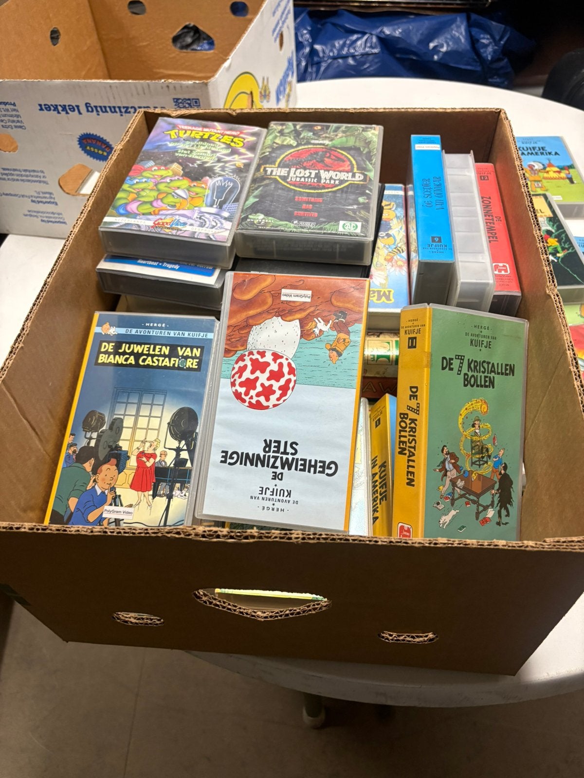 2 dozen vol vhs van jaren 90 films en avonturen kuifje, CD & DVD, VHS | Enfants & Jeunesse, Enlèvement ou Envoi, Comme neuf, VHS