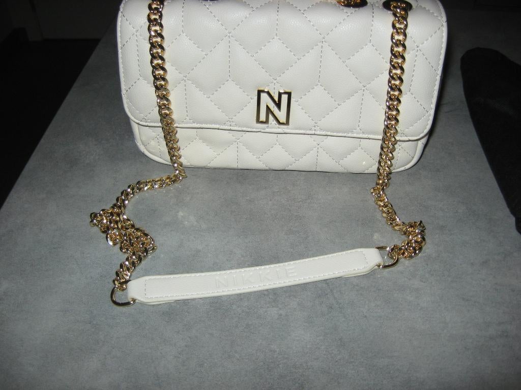 Schoudertas nieuw NIKKIE, Handtassen en Accessoires, Tassen | Schoudertassen, Overige merken, Beige, Nieuw, Ophalen of Verzenden