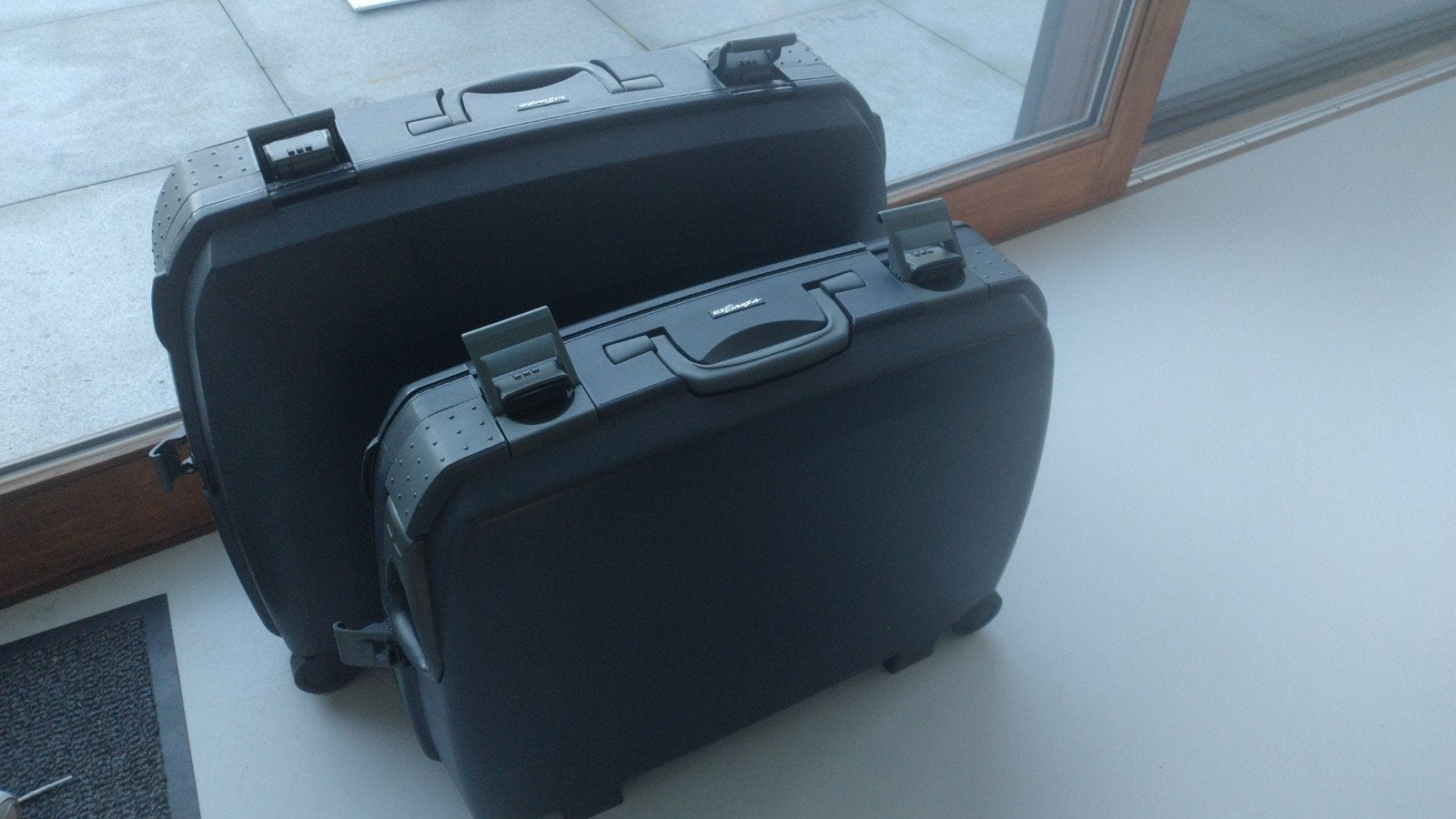 2 reiskoffers, Enlèvement