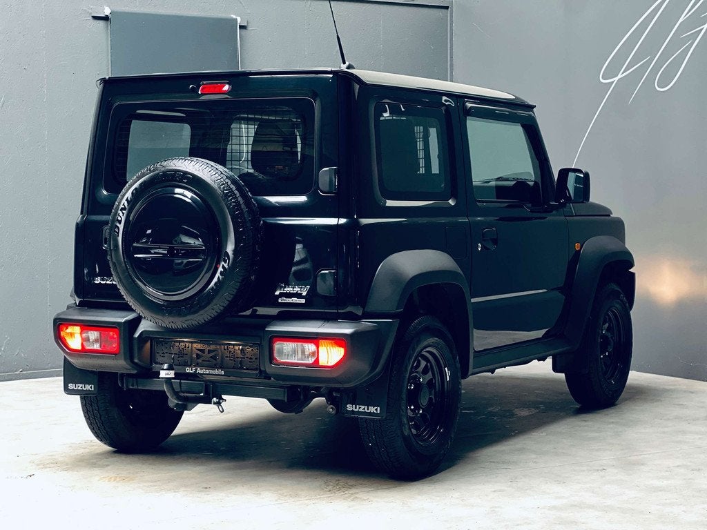 Suzuki Jimny 1.5i *4x4-ALLGRIP*CLIM*CRUISE* (bj 2023), Auto's, Suzuki, 75 kW, Stof, Gebruikt, 4 cilinders