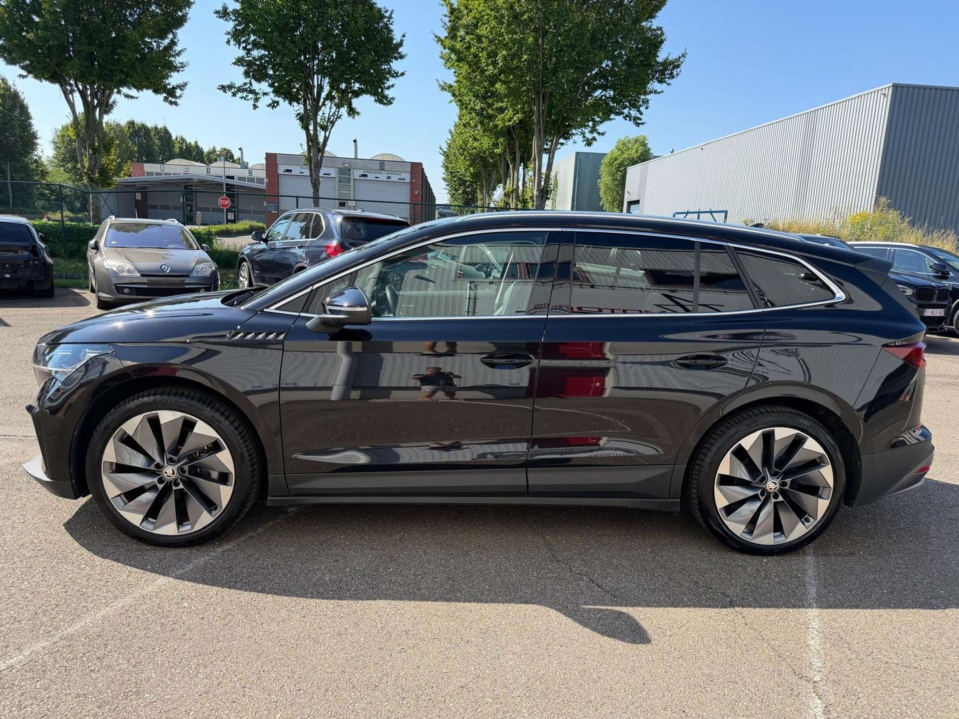 Skoda Enyaq 82kWh Sportline Keyless/Leder/Memory/Trekh/Carpl, Auto's, Automaat, Gebruikt, Parkeersensor, 5 zetels