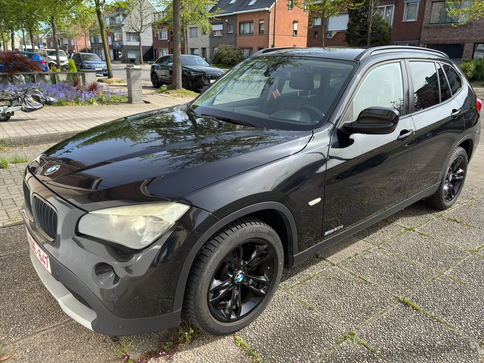 BMW X1 sDrive20d 163pk Leder Navi Zetelverwarming Trekhaak, X1, Euro 5, 1995 cc, Zwart