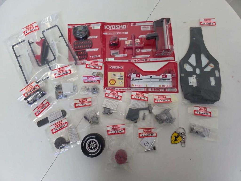 Lot Kyosho/DeAgostini Ferrari F2004 + radiocommande Perfex, Hobby & Loisirs créatifs, Modélisme | Radiocommandé & Téléguidé | Voitures