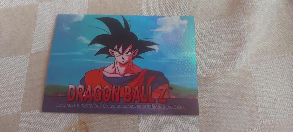 dragonball z kaart reverseholo Goku serious face fraai, Ophalen of Verzenden, Zo goed als nieuw, Losse kaart