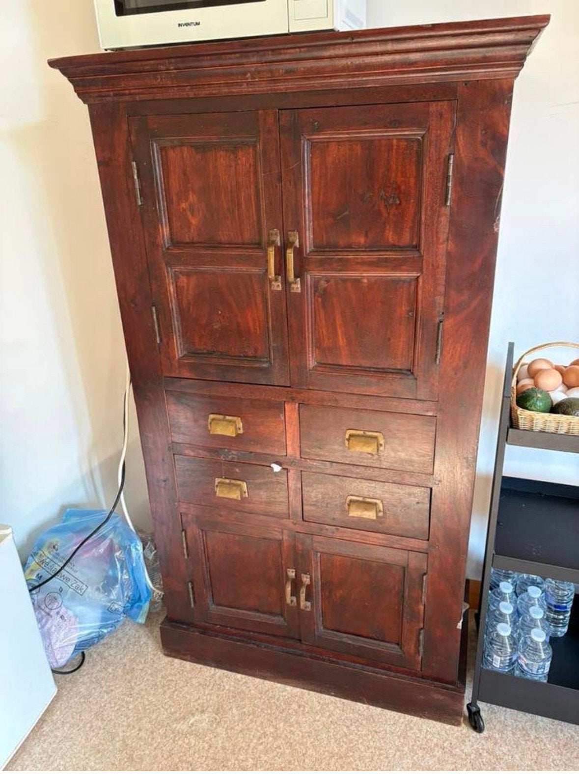 Massief houten kast, Ophalen